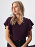 Purple flutter sleeve V-neck top on model, lightweight polyester blouse