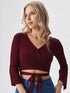 Maroon wrap crop top with flared long sleeves and tie waist in polyester fabric, stylish women’s evening wear