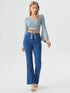 Light blue wrap tie long sleeve crop top on model, chic polyester blouse