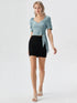 Light blue puff sleeve wrap crop top with sweetheart neckline and tie waist