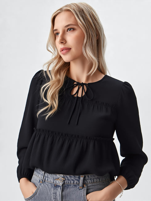 Black long sleeve peplum top with tie-up neckline