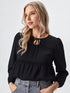 Black long sleeve peplum top with tie-up neckline