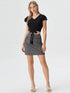 Black flutter sleeve button tie-front crop top on model, polyester chic women’s top