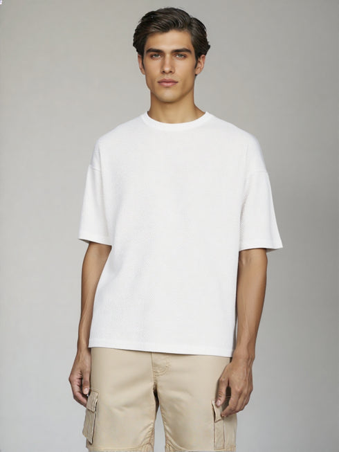 White Oversized Basic T-Shirt for men styled with beige shorts
