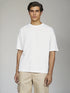 White Oversized Basic T-Shirt for men styled with beige shorts