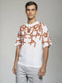 White Oversized Urban Graphic T-Shirt with orange abstract line design