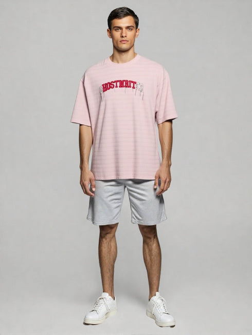 Pink Oversized T-Shirt with embroidered "Ghostwriter" lettering on chest