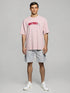 Pink Oversized T-Shirt with embroidered "Ghostwriter" lettering on chest