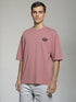 Dusty Pink Oversized T-Shirt with small chest graphic print
