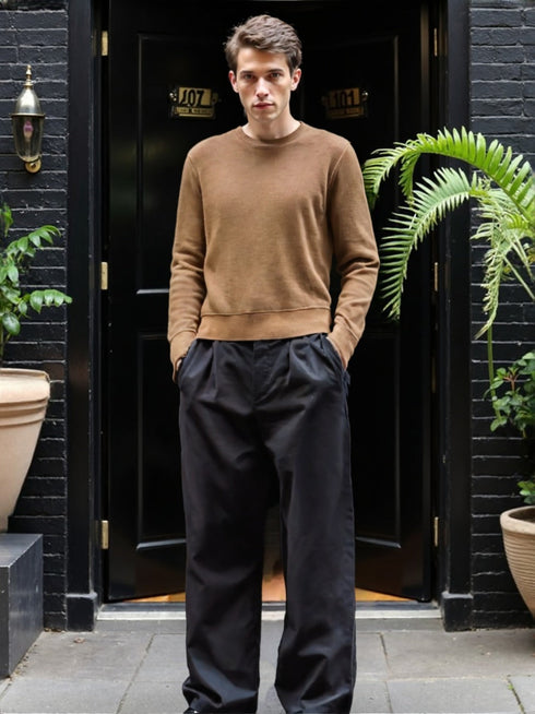 Men’s Brown Classic Crewneck Sweater paired with black trousers