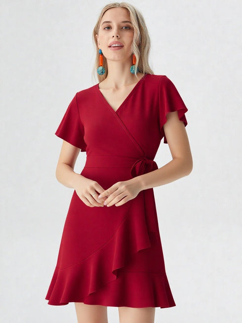 Red ruffle wrap dress with flutter sleeves and tie waist