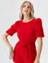 Red puff sleeve belted playsuit with round neckline and short length