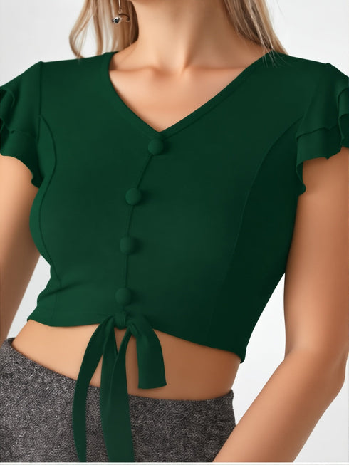 Woman wearing emerald green ruffle sleeve button front crop top with tie hem