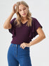 Purple flutter sleeve V-neck top on model, lightweight polyester blouse