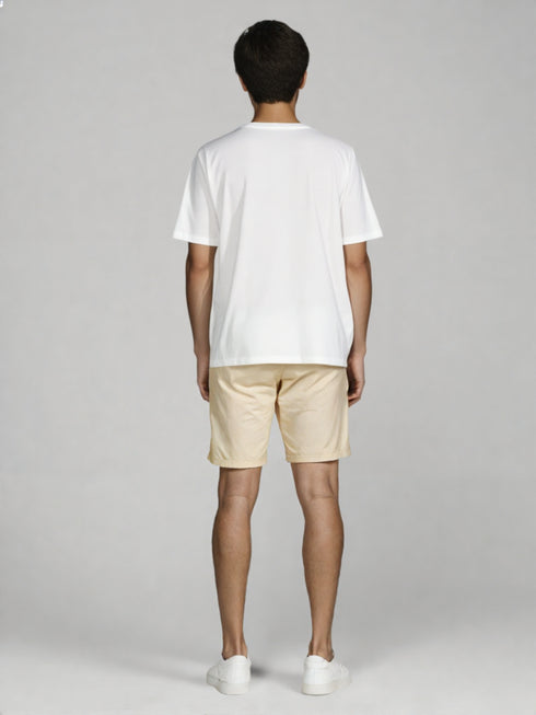White Oversized Basic T-Shirt for men styled with beige shorts
