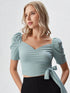 Light blue puff sleeve wrap crop top with sweetheart neckline and tie waist