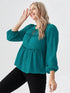 Teal peplum long sleeve top with tie-neck and puff sleeves
