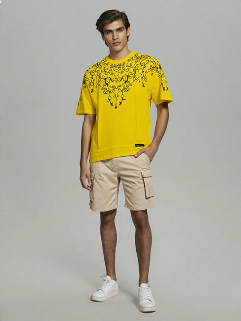 Yellow Oversized T-Shirt with bold black floral graphic design