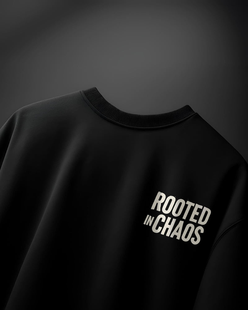 Rooted in Chaos unisex oversized terry cotton t-shirt with a relaxed streetwear fit
