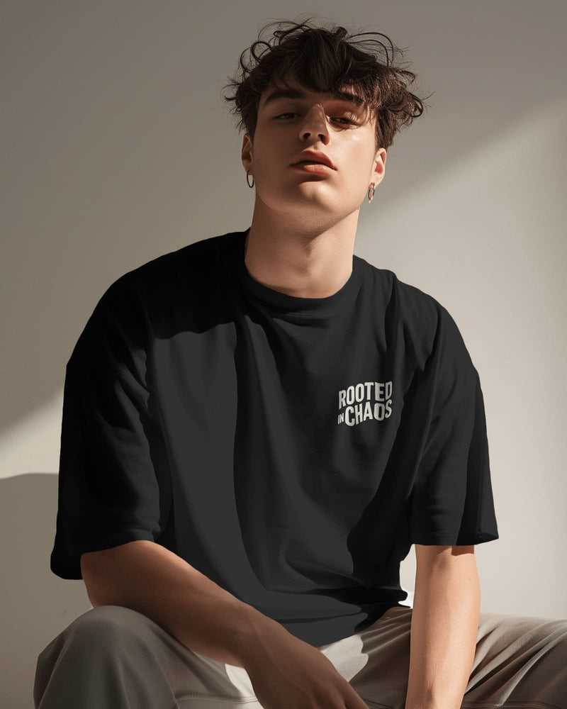 Rooted in Chaos unisex oversized terry cotton t-shirt with a relaxed streetwear fit